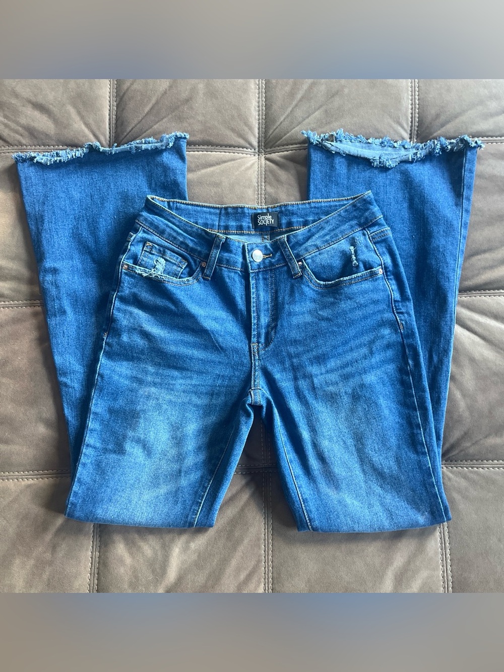Simple Society Frayed-Hem Flared Jeans in Blue